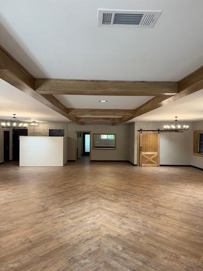 Beautiful Wood-Look Flooring with Wooden Beams 