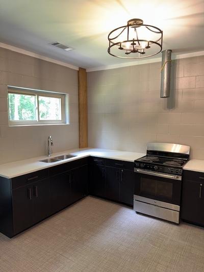 Modern Kitchen with Beautiful Light Fixture