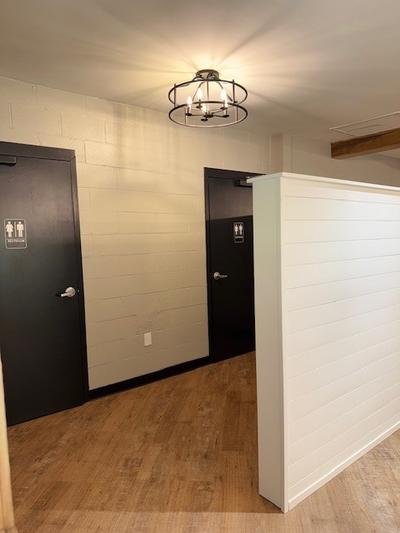 Bathroom Entryway with a White, Shiplap, Divider Wall 